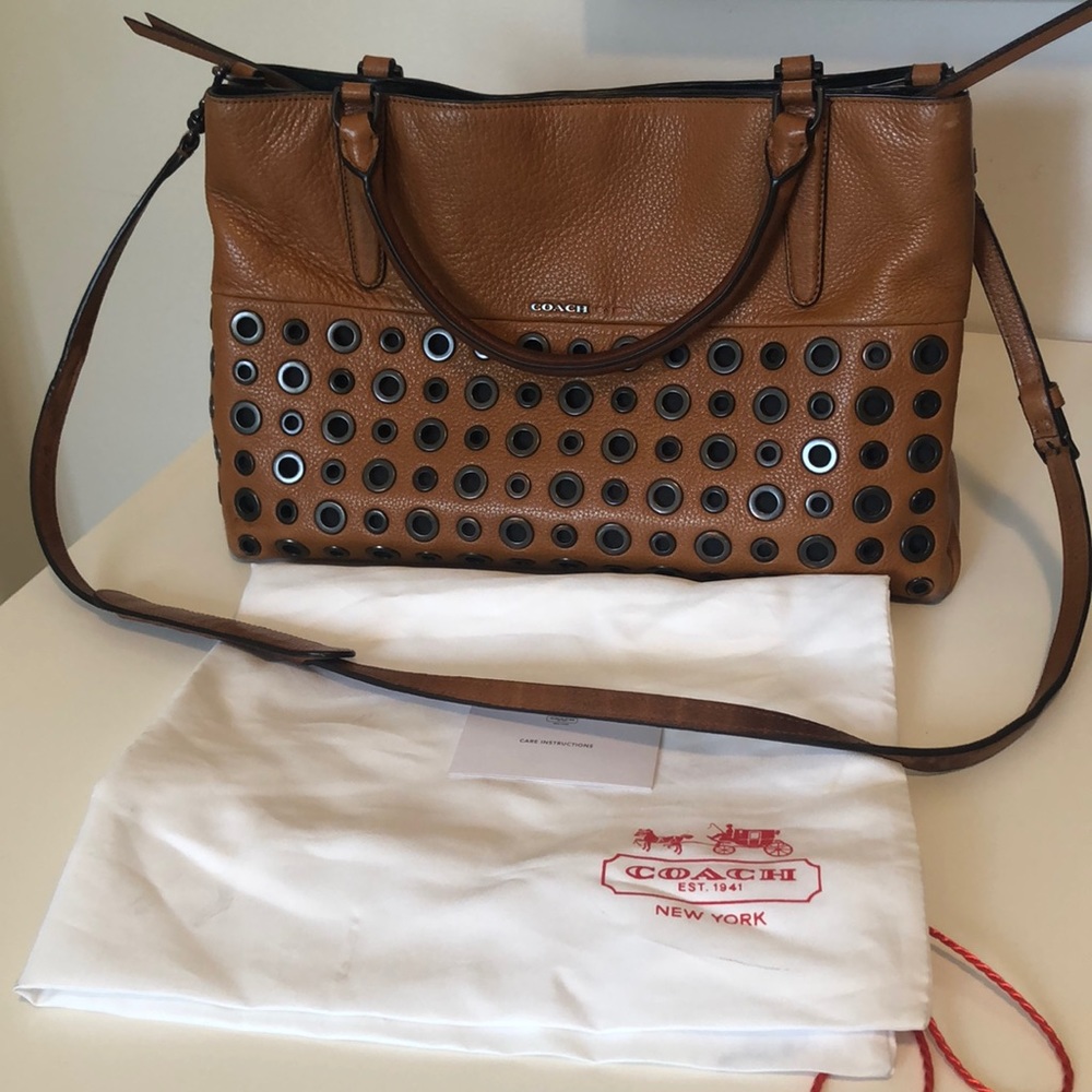 Coach borough grommet bag saddle- used